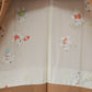 A beige women's haori coat with a child-like design on the lining｜裏地に童が表現されたベージュ色の女物羽織