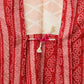 A vermilion-red women's haori coat with striking stencil dyeing｜型染め絞りが印象的な朱赤の女物羽織